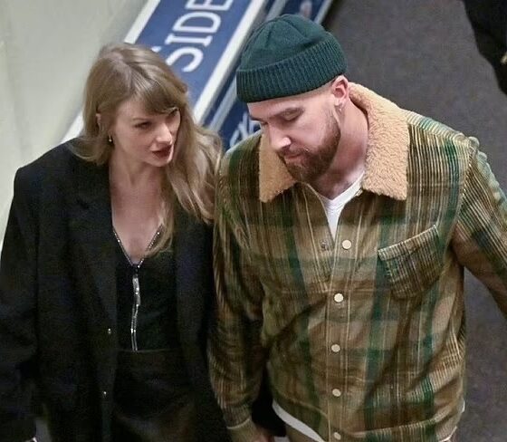 Taylor Swift gazes lovingly at her boyfriend Travis Kelce as they leave Arrowhead together pics