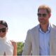 Meghan Markle and Prince Harry walk at the Royal Salute